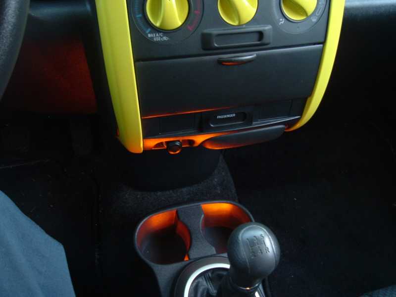 LED\'s in my cup holder of my Scion xB. You can see just how bright they are even in the daylight
