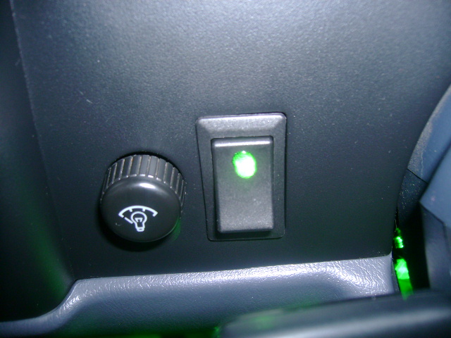 Green Scion OEM style switch in my \'98 Tacoma