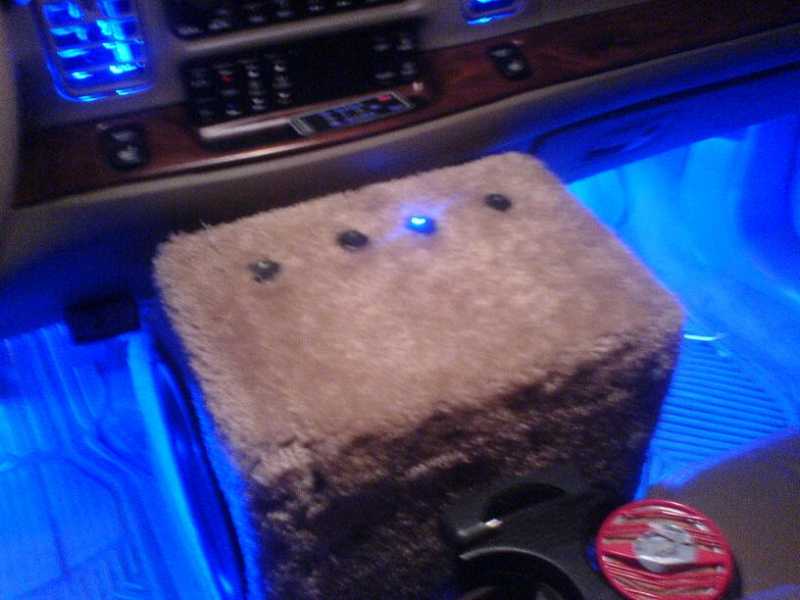 4 round LED rocker switches on top of a custom sub box!