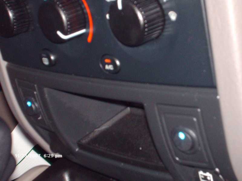 Mounted in lower dash area of 2004 Jeep Grand Cherokee, above adapter outlets.  Easily drilled holes, and snug fit!  Great for runnung two front neons, and two rear neons!