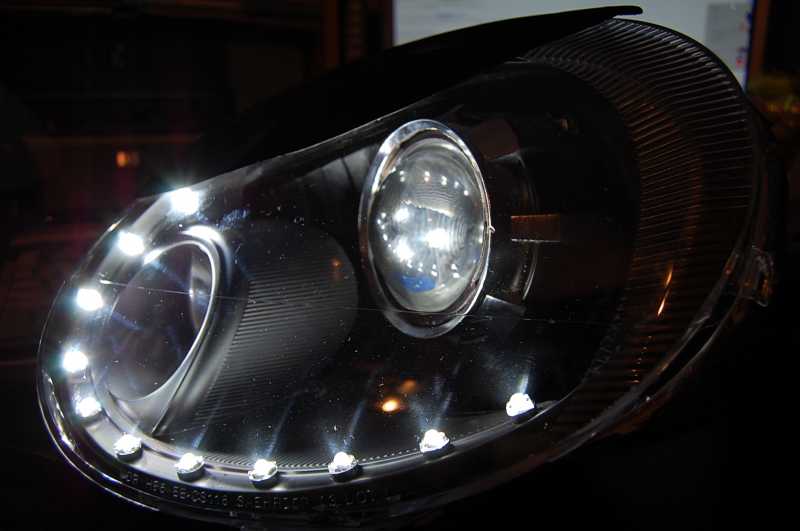 Custom headlight retrofit for my SRT-4 using 11 white superflux LEDs for the Audi R8 mod.