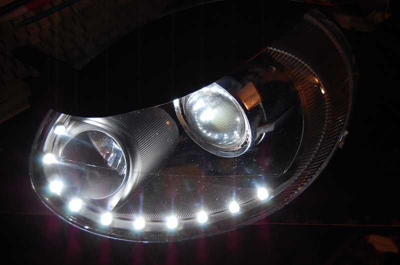 Custom headlight retrofit for my SRT-4 using 11 white superflux LEDs for the Audi R8 mod.