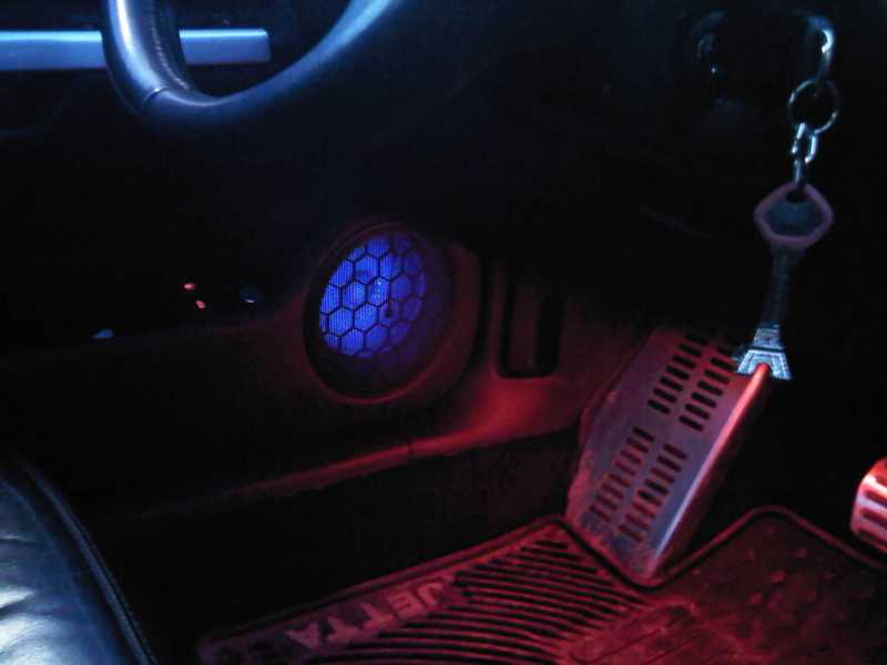 Blue LEDs in the speakers of my car. Mounted on the inside of the grille, pointing toward the speaker.