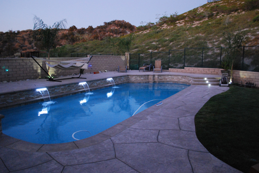 On the right I used the Pre-wired superflux cool white lights in my steps.
In the pool are the cool white LED strips (19") and along the back wall under the tree is a 1 watt LED flood