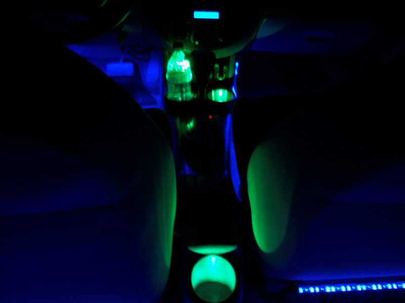 Green LED's in each cup holder, they're super bright and look amazing. I get tons of compliments on them. 