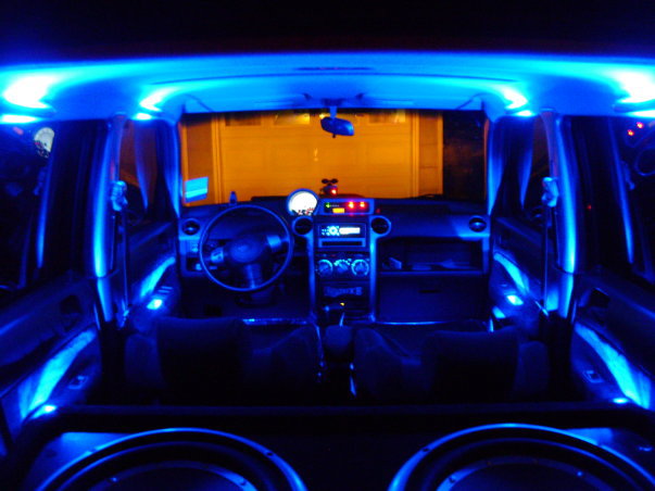 Superflux in door handles and led strips in the grab handles.