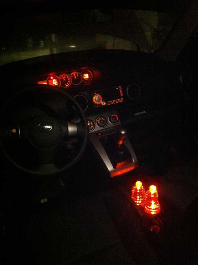 1 orange pre-wired surface mount LED in center of each cup holder.