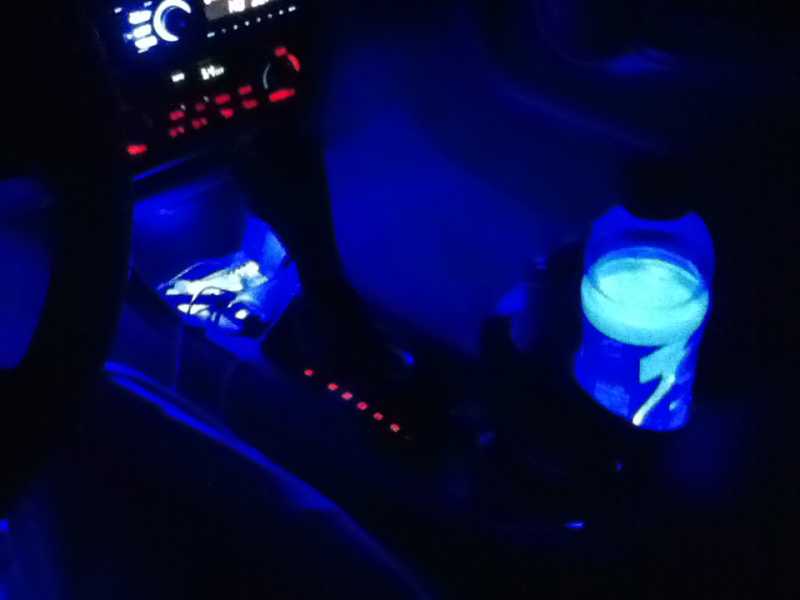 1 blue prewired surface mount L.E.D. in each footwell and the center cubby