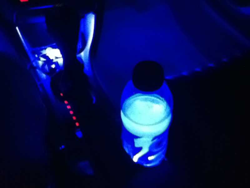 1 blue prewired surface mount L.E.D. in each footwell and the center cubby