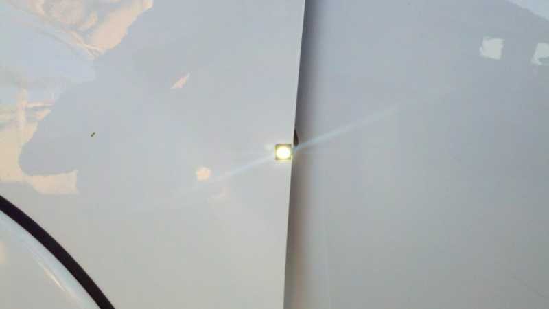 Oznium 3 chip SMT led in superwhite mounted and wired to the turn-signals.  2011 "Taco"ma