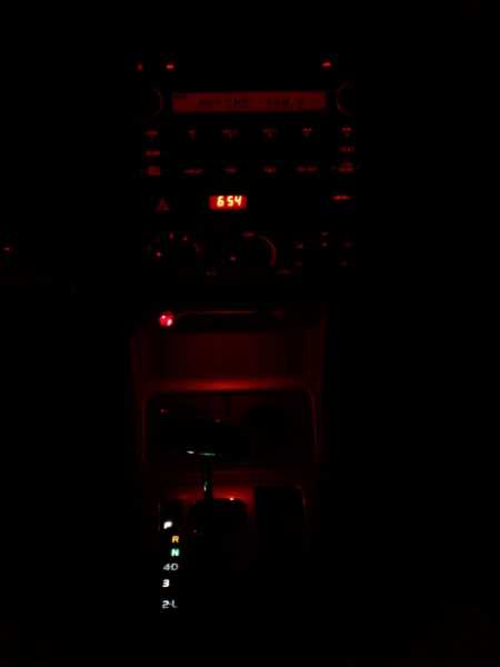 Tri-Chip in orange matches the dash illumination perfectly to light up the cubby hole in front of the cup holders.  Also Tri-Chip superwhite LEDs in the gear indicator area.  Both are wired to the dash light dimming circuit. 2011 "Taco"ma